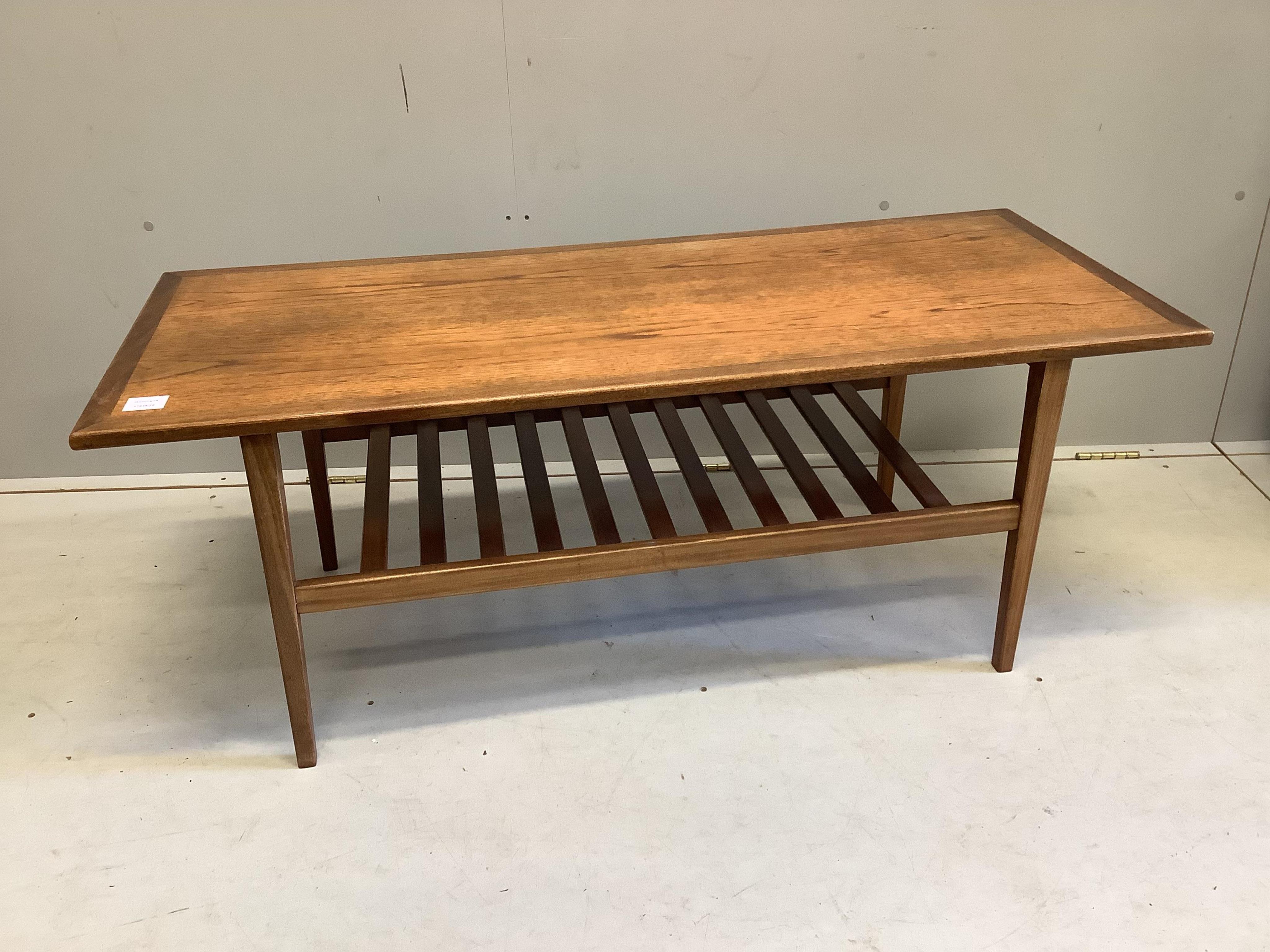 A mid century rectangular teak two tier coffee table, width 122cm, depth 51cm, height 48cm